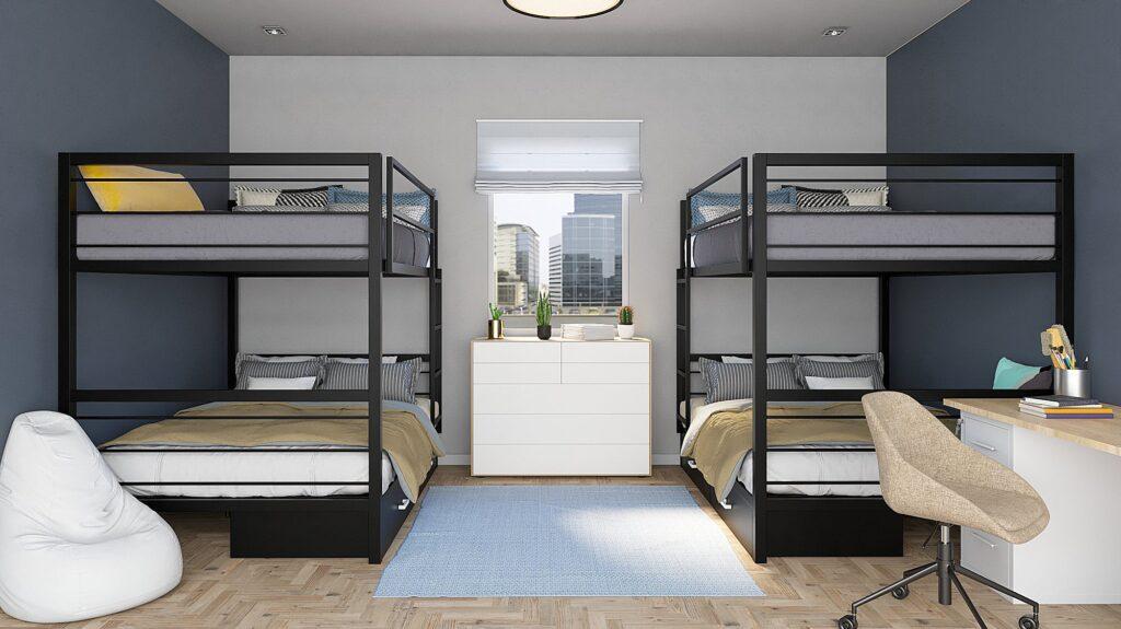 Habitación con dos catres modernos y gaveteros incluidos en la parte inferior de cada cama catre doble